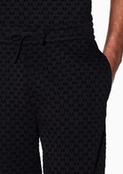 Pantaloni joggers in jersey con logo all over Nero XM002904 AF10818 UC001 ARMANI EXCHANGE 