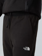 The North Face Joggers in pile Mountain Athletics Uomo TNF Black NF0A893S JK3 THE NORTH FACE 