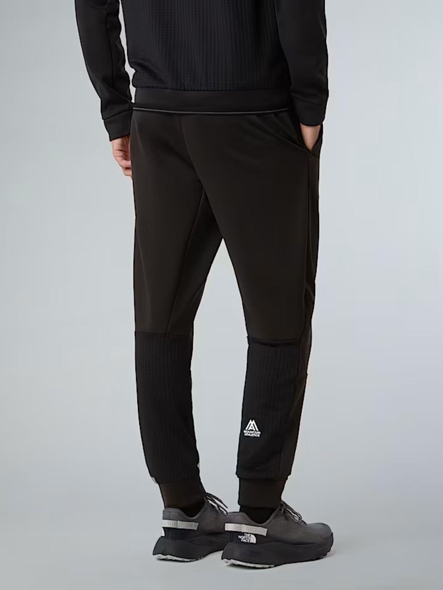 The North Face Joggers in pile Mountain Athletics Uomo TNF Black NF0A893S JK3 THE NORTH FACE 