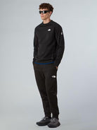 The North Face Joggers in pile Mountain Athletics Uomo TNF Black NF0A893S JK3 THE NORTH FACE 