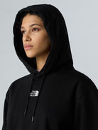 The North Face Felpa con cappuccio corta in vita Essential Donna TNF Black NF0A89EX JK3 THE NORTH FACE 
